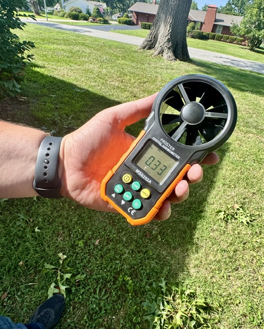 Professional airflow meter used during dryer vent service